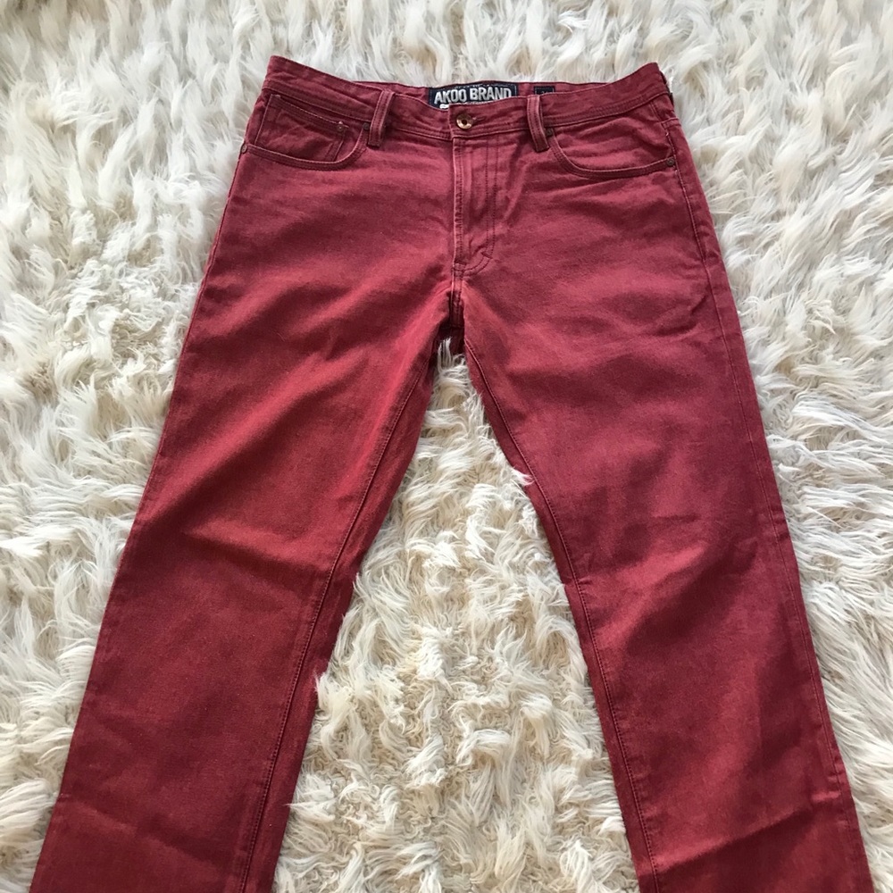 Men’s Akoo red jeans.